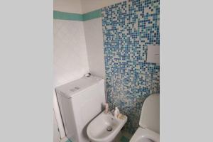 Ванная комната в A.E. Stintino Relax House