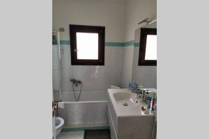 Ванная комната в A.E. Stintino Relax House
