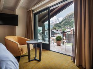 Atpūtas zona naktsmītnē Hotel National Zermatt