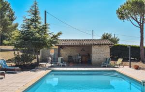 a villa with a swimming pool and a house at Stunning Home In Sainte Gemme in Sainte-Gemme +6 photos