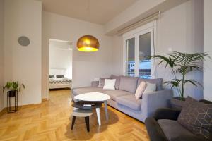 Posedenie v ubytovaní Acropolis View Penthouse N