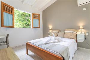 Letto o letti in una camera di Thijo Guadeloupe