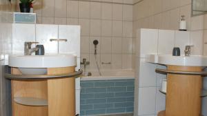 Koupelna v ubytování De Buitenhof + 26 fotografií