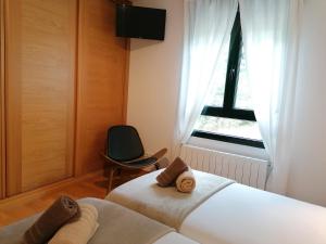 Posteľ alebo postele v izbe v ubytovaní PENSION ROSELLA