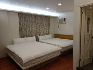 Malin 100 B&B Jiaoxiにあるベッド