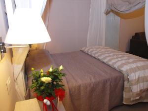 Posteľ alebo postele v izbe v ubytovaní B&B Il Senesino