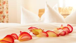 Llit o llits en una habitació de Hotel Garni am Hechenberg
