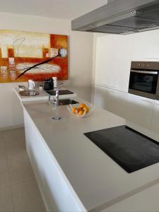 Kuchyňa alebo kuchynka v ubytovaní Olivia Holidayhouse Maspalomas