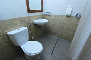 Baðherbergi á Griya Sentana Hotel