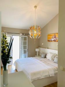 מיטה או מיטות בחדר ב-Villa Olivia Maspalomas with private pool