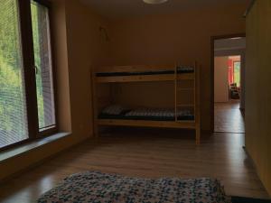 Postel nebo postele na pokoji v ubytování Apartmán Švadlenka