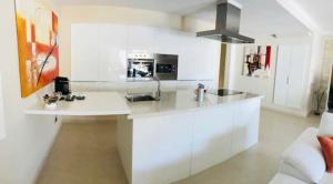 Kuchyňa alebo kuchynka v ubytovaní Olivia Holidayhouse Maspalomas