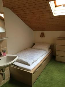 A bed or beds in a room at Haus Praxmarer