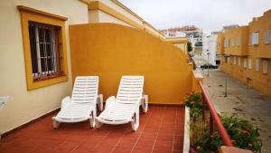 A seating area at Urb Tortuga 1 Adults Recommended