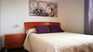 A bed or beds in a room at Urb Tortuga 1 Adults Recommended
