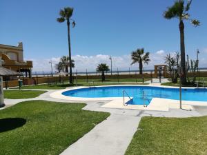 The swimming pool at or close to Urb Tortuga 1 Adults Recommended