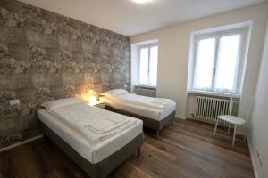 Posteľ alebo postele v izbe v ubytovaní Appartamento L’Anzolim