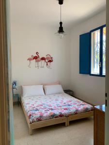Letto o letti in una camera di Pomelie di Vendicari