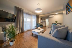 TV a/nebo společenská místnost v ubytování Villa Olivetum
