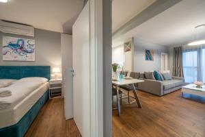 Postel nebo postele na pokoji v ubytování Villa Olivetum