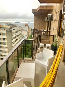 Μπαλκόνι ή βεράντα στο Leblon Flat +19 φωτογραφίες