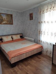Cama o camas de una habitación en Apartment на Героїв Небесної Сотні 39 кв96