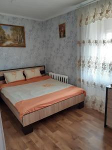 Cama o camas de una habitación en Apartment на Героїв Небесної Сотні 39 кв96