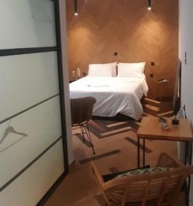 Postel nebo postele na pokoji v ubytování Sroom Apartment