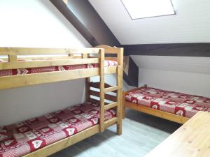 Postel nebo postele na pokoji v ubytování Chalet Lucie LE CHEVAL NOIR