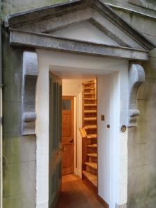 an entrance to a building with a door and stairs at Kirkview House in Moffat