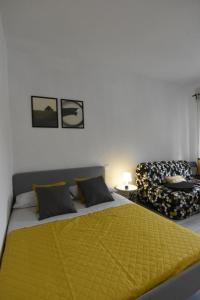 מיטה או מיטות בחדר ב-La Casa di Oreno