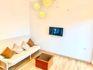 Un televizor și/sau centru de divertisment la Villa Gloria