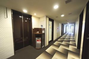 a hallway of an elevator in a building at Meitetsu Inn Nagoya Nishiki in Nagoya