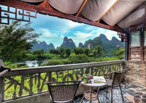 Foto da galeria de Yangshuo Mountain Retreat em Yangshuo