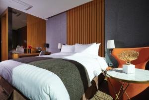 Jeongseon Intoraon Hotel客房内的一张或多张床位