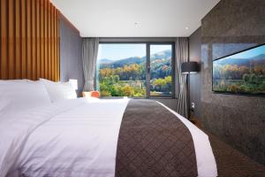 Jeongseon Intoraon Hotel客房内的一张或多张床位