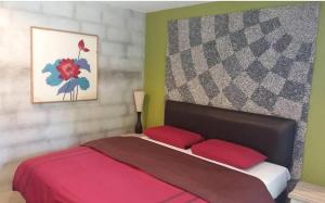 Letto o letti in una camera di The Curve Residence