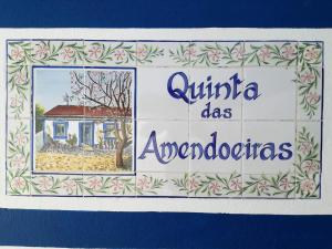 a sign for a house that says antigua does endodontos at Hakuna matata in Benagil