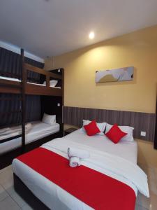 Katil atau katil-katil dalam bilik di Hotel Ideal Senawang