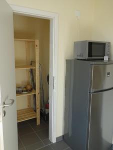 Kuchyň nebo kuchyňský kout v ubytování Schiller Apartments Fabrikantenwohnung
