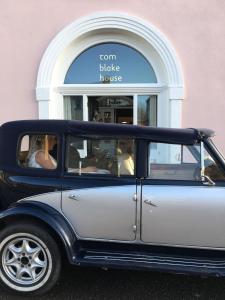 an old car parked in front of a building at Tom Blake House in Kells +22 photos