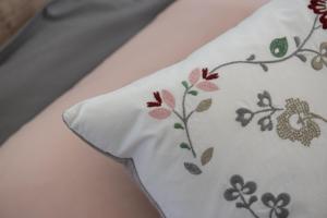 A bed or beds in a room at Le Due Torri