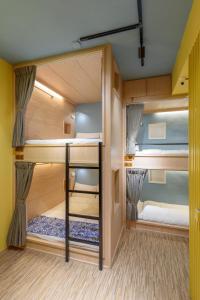 Letto o letti in una camera di 山多香青年民宿 Santhosham Hostel