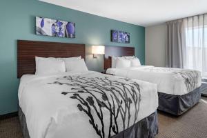 Postel nebo postele na pokoji v ubytování Sleep Inn Durango