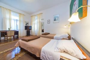 Кровать или кровати в номере B&B Sesame Inn