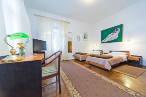 Кровать или кровати в номере B&B Sesame Inn