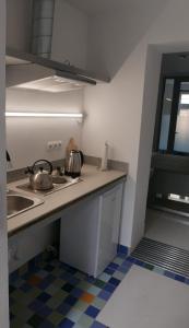 Kuchyň nebo kuchyňský kout v ubytování ROOMS BYTOM