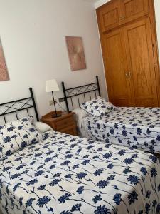 Ein Bett oder Betten in einem Zimmer der Unterkunft Casa el Pez