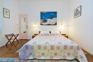 Кровать или кровати в номере B&B Sesame Inn