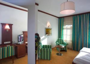 Łóżko lub łóżka w pokoju w obiekcie Hotel Restaurant Wallner I contactless check-in